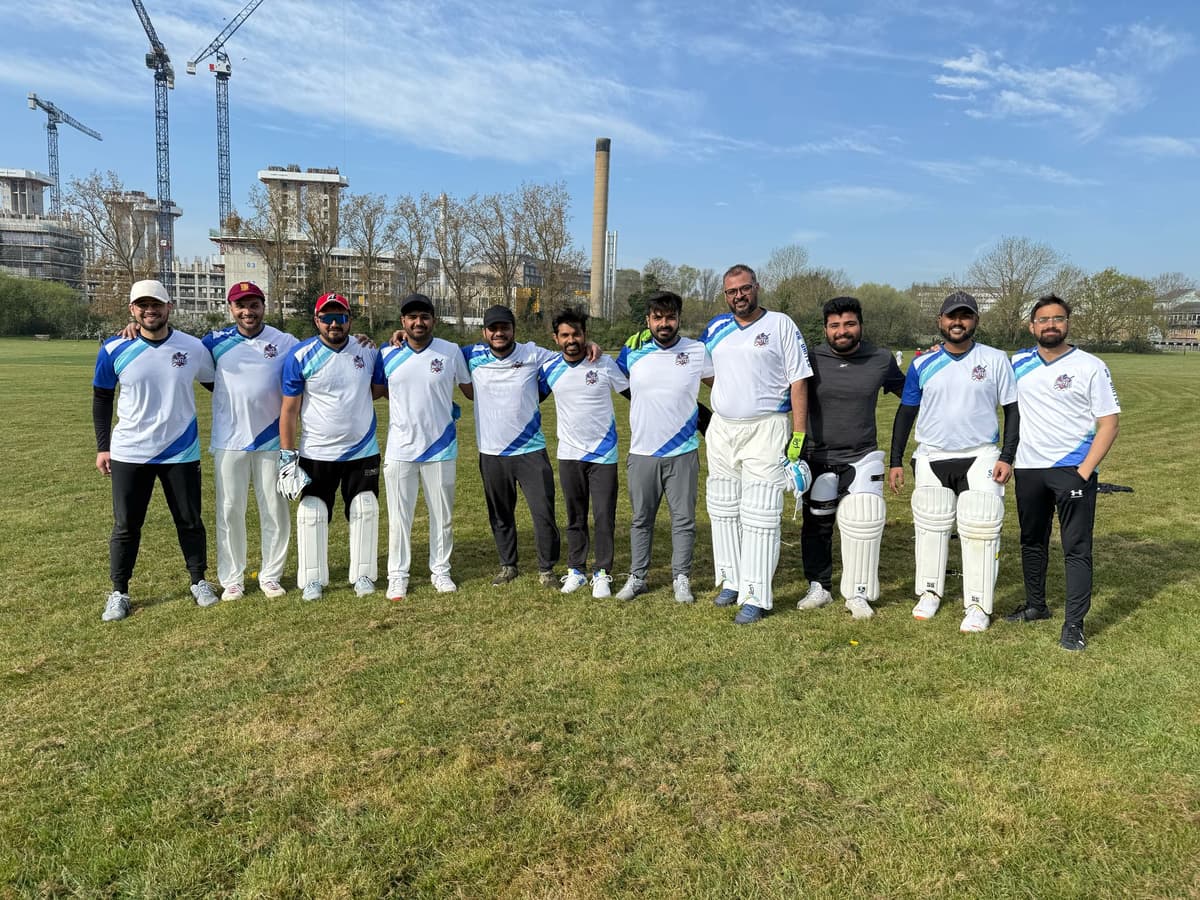 GQ United CC team photo with players in their blue and white jerseys
